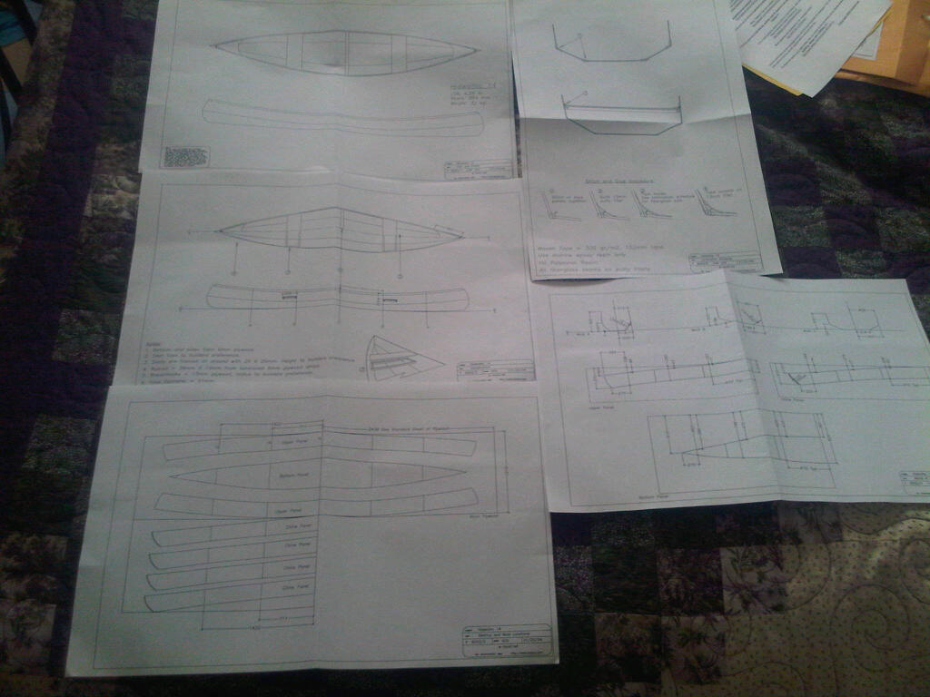 The plans
The plans are laid out here on the bed.  I was a little bewildered by all of the information but managed to read through it a few times and think everything will be okay. 

Keywords: HC14 Canoe